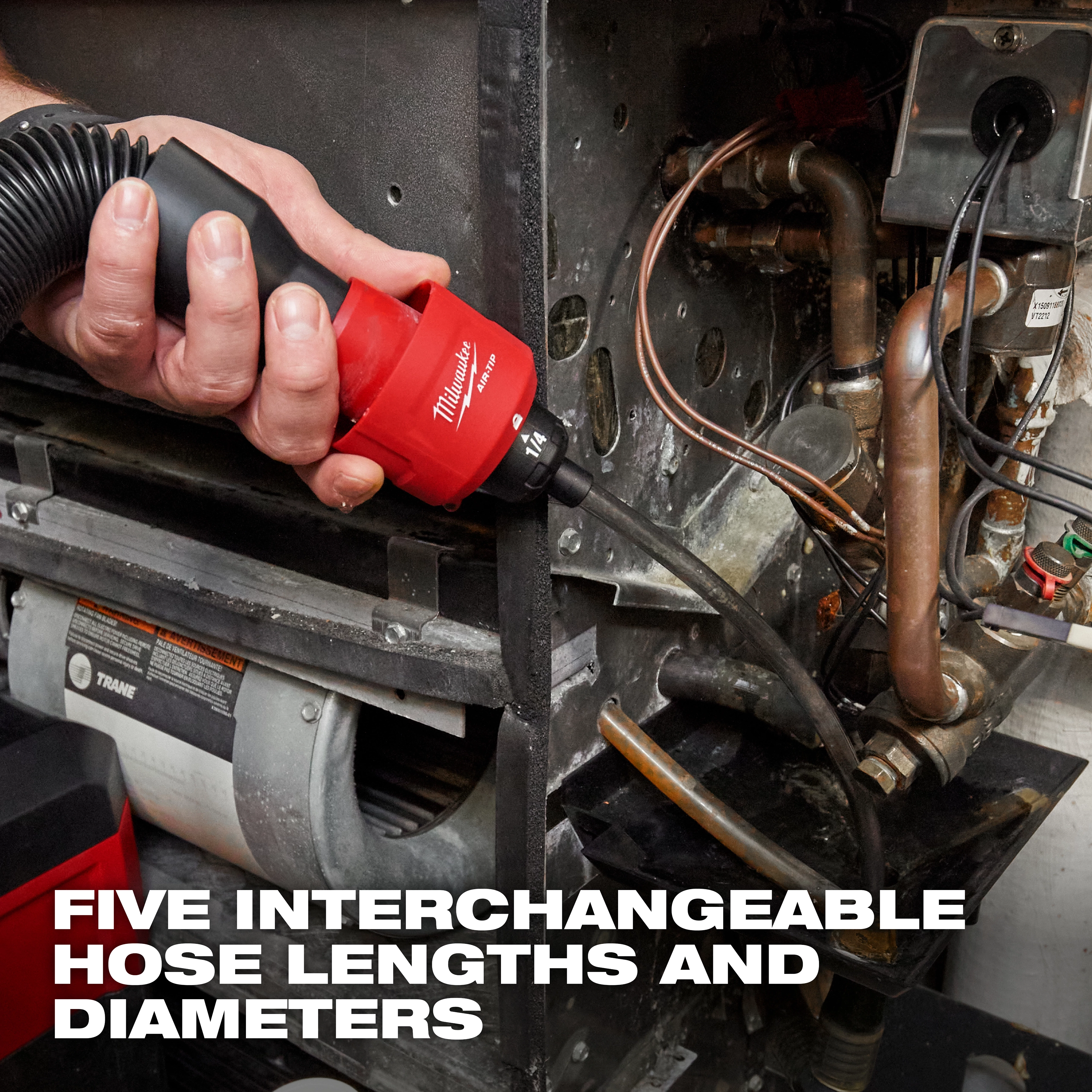 A hand is using the AIR-TIP™ Long Reach Flexible Micro Hose Set attached to a piece of machinery. The image highlights text that reads, "Five Interchangeable Hose Lengths and Diameters," emphasizing the tool's versatility.