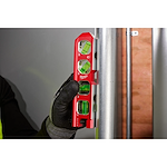 Image of the Milwaukee 6.5” Pipe Lock Billet Torpedo Level being used by a worker on a jobsite