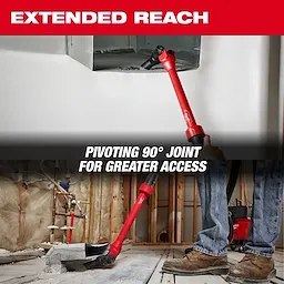 A person uses the AIR-TIP™ Pivoting Extension Wand to clean an overhead vent. The tool has a red handle with a pivoting 90-degree joint, providing extended reach and greater access. The background shows a partially finished room with exposed plumbing.