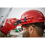 A red hard hat with a front brim and vented design, featuring a 4-point ratcheting suspension system. This is a Red Front Brim Vented Hard Hat w/4pt Ratcheting Suspension - Type 1, Class C.