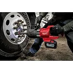 Worker using the M18 FUEL™ 1" D-Handle Ext. Anvil High Torque Impact Wrench w/ONE-KEY™