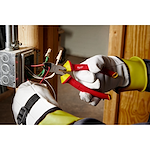 Image of the Milwaukee 1000V Insulated 8" Diagonal Cutting Pliers being used by an electrician