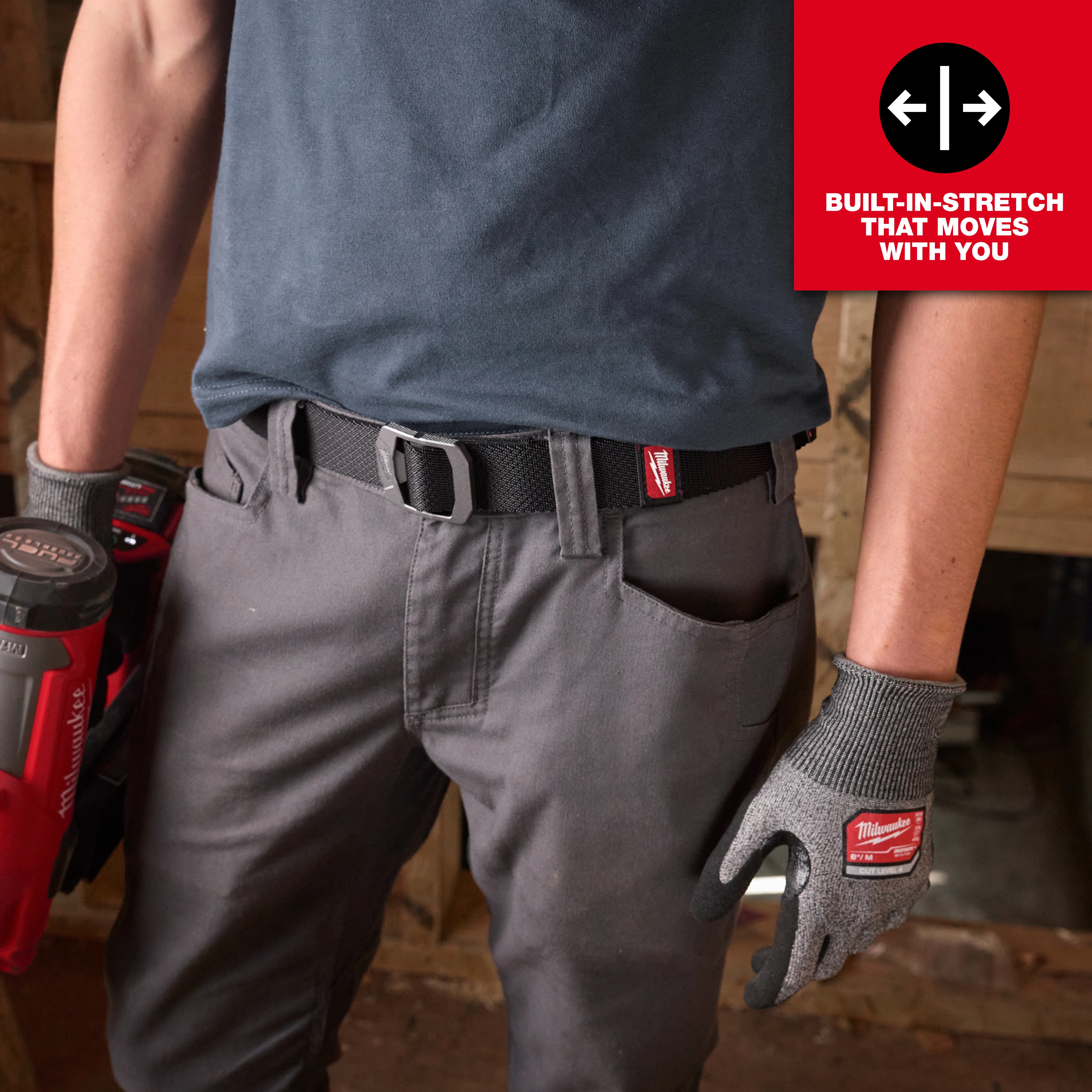 Image of a person wearing the Milwaukee FREEFLEX™ Nylon Webbing 1.5" Belt